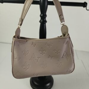 Adrienne Vittadini embossed logo hobo bag in faux leather